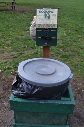 Garbage can and disposal bags for the off-leash dog exercise area